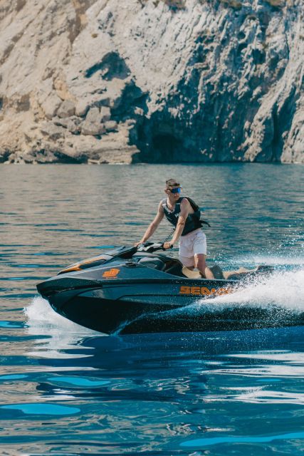 Alcudia: Bay of Alcudia Jet Ski Tour with Photos - Leaving Alcudiamar harbour on a jet ski