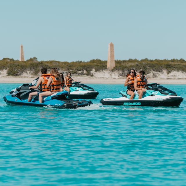 Alcudia: Bay of Alcudia Jet Ski Tour with Photos - Riding toward Aucanada lighthouse