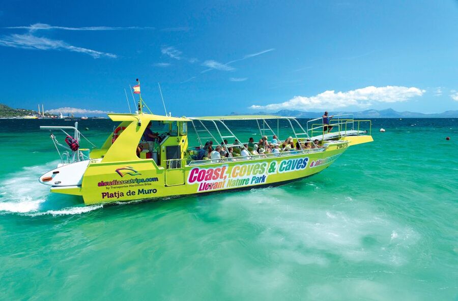 Alcudia: Caves & Coastline Boat Trip w/ Snorkelling - What the Alcudia coast looks like from a speedboat