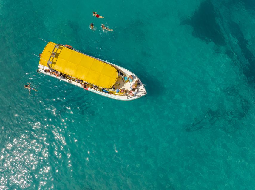 Alcudia: Coll Baix Beach & Sea Caves Cruise with Snorkeling - The 40-minute ride across Alcudia Bay