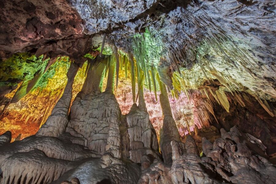 Alcudia: Half-day Caves of Hams, Blue Caves and documentary - Entering the Classic Cave and its hooked formations