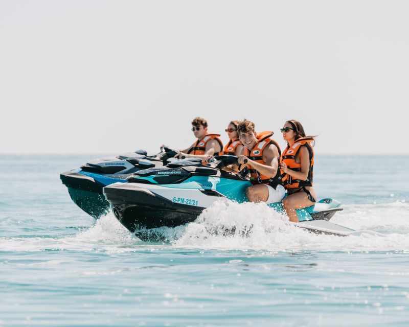 Alcudia: Jet Ski Tour to Lighthouse Island with photos - Riding across the clear waters of Alcudia Bay