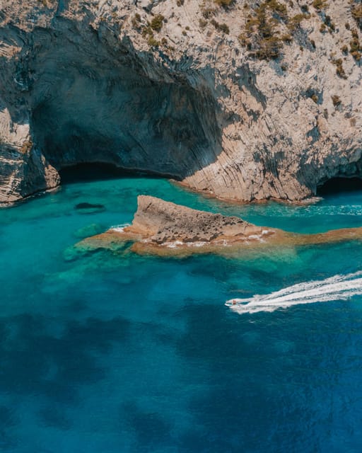 Alcudia: JetSki Tour Coll Baix beach & Caves (free Photos) - The swim stop in clear water