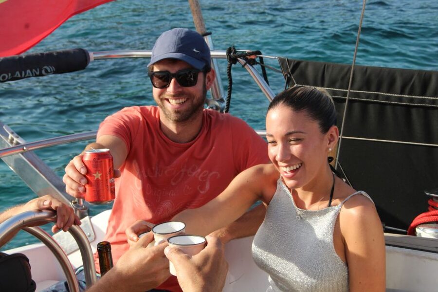 Alcudia: Private Sunset Boat Trip with Glass of Wine & Snack - Watching sunset from the water