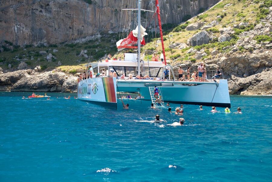Alcudia: Sunset Catamaran Tour with Dinner and Snorkeling - A simple barbecue served on the catamaran
