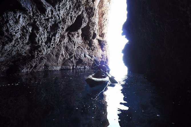 Breathtaking guided Kayak tour from Sant Elm the bay of Cala en Tió - Paddling past Punta de na Galinda and the sea caves
