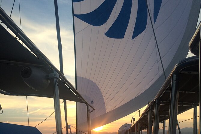 Catamaran sailing at sunset with tapas Palma de Mallorca - The Cala Vella stop: swim, paddleboard, or stay dry
