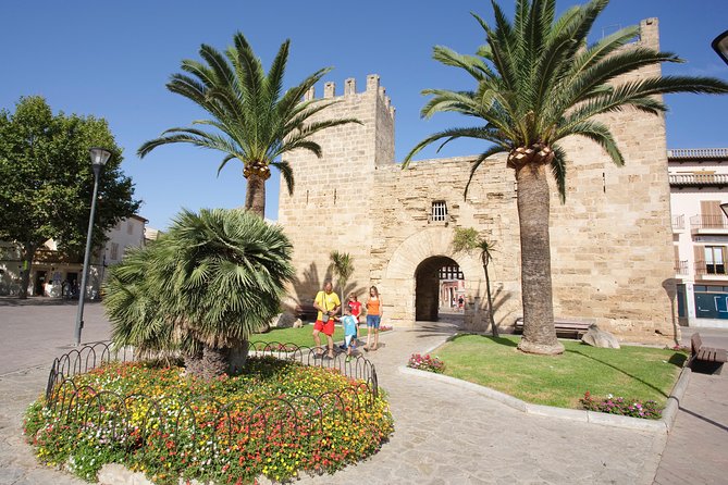 Discover Alcudia old town on a private walking tour - Walking the medieval walls above Alcudia