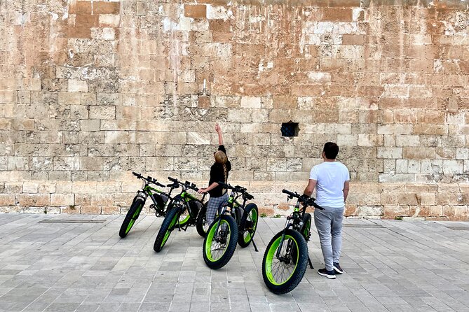 Exclusive Fat Tire E-Bike Tour in Palma - Plaça de Cort and the old city opening