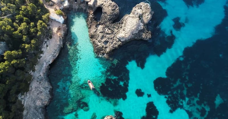 From Cala Figuera: Boat Tour to Cala Marmols & Caló de Moro - Cala Llombards and the coast of sea caves