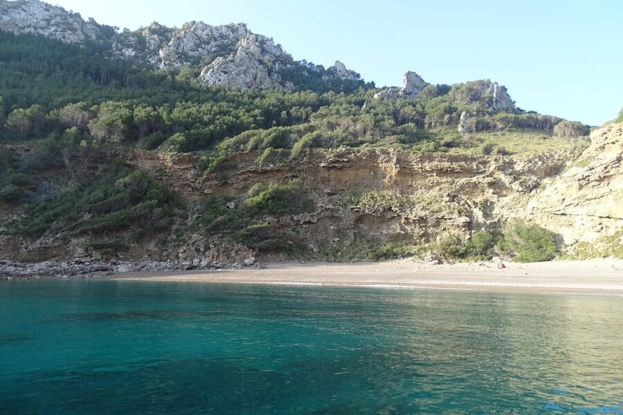 From Can Picafort: Dolphin Watching and Cave Boat Trip - Leaving Can Picafort before the coast wakes up