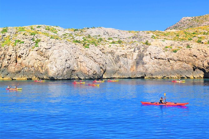 Kayak Secret Beach - The return beneath Cavall Bernat’s cliffs