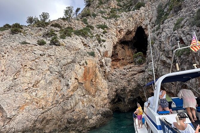Mallorca Beach & Caves 4hr Boat Trip Drinks, Tapas, SUP & Snorkel - Alcanada Lighthouse and the final swim