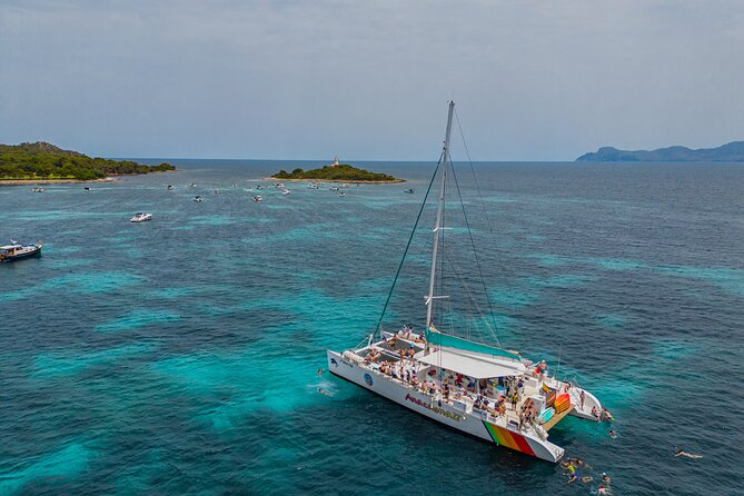Mallorca Catamaran Cruise with Scenic Views and BBQ Lunch - The real mood: easygoing cruise or party boat?