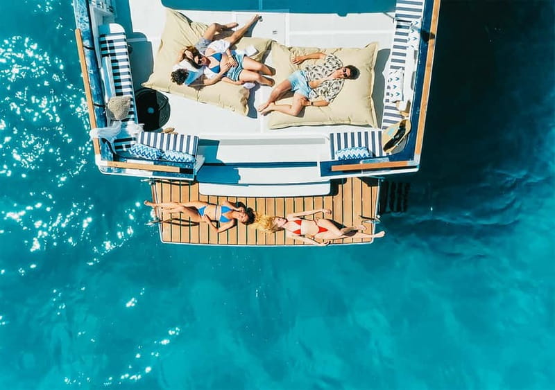 Mallorca: Palma Boat Tour & Snorkeling with Drink Included - Music, drinks, and the onboard atmosphere