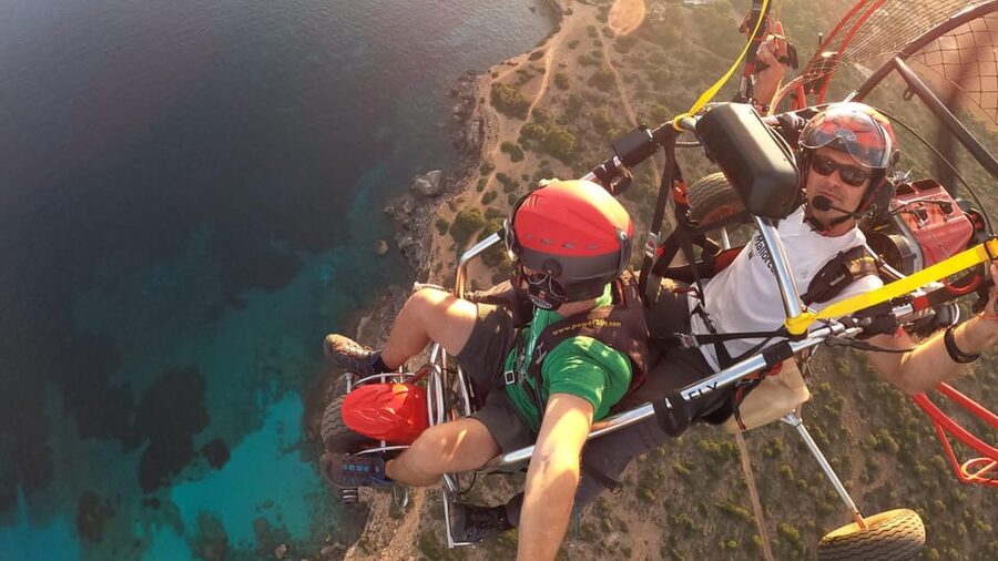 Mallorca: Paratrike Flight with Acrobatics and Engine Stop - Cliffs, open sea, and changing colors