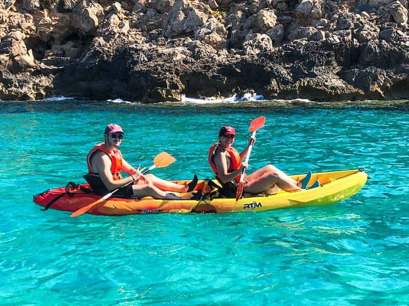 Mallorca: Sea Cave Kayaking Tour with Snorkeling and a Snack - The guides and the feel of the outing
