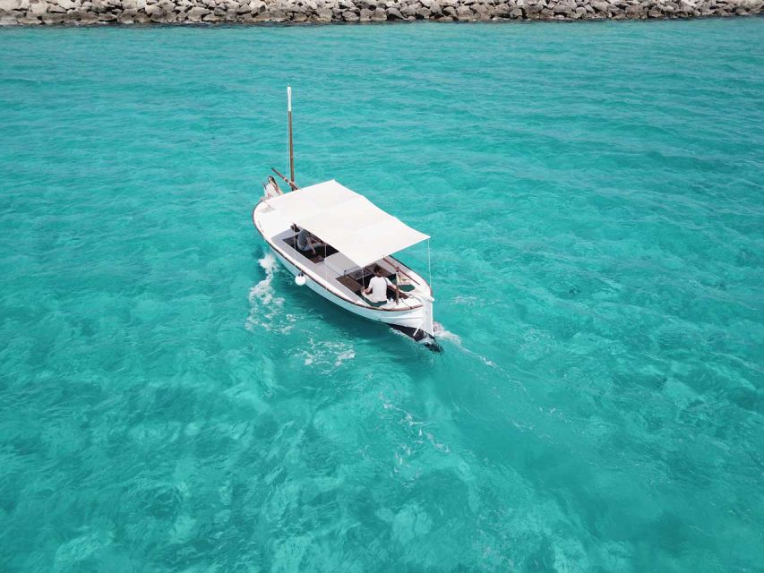 Mallorca: Southern Beaches Private Llaut Boat Tour - Ses Covetes and the first 15 minutes on the water