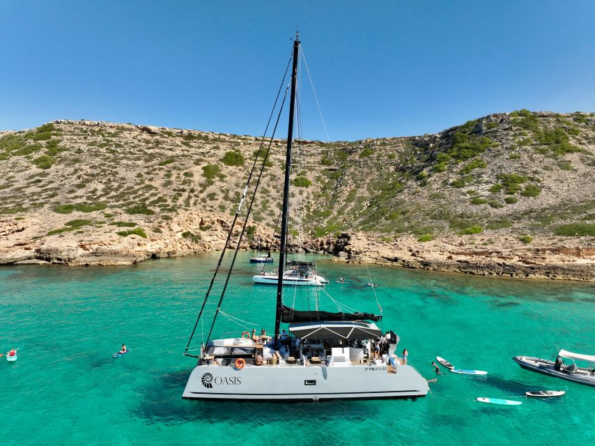 Palma: Cueva Verde and Cala Vella Catamaran Cruise with BBQ - The bar, music, and the mood on board