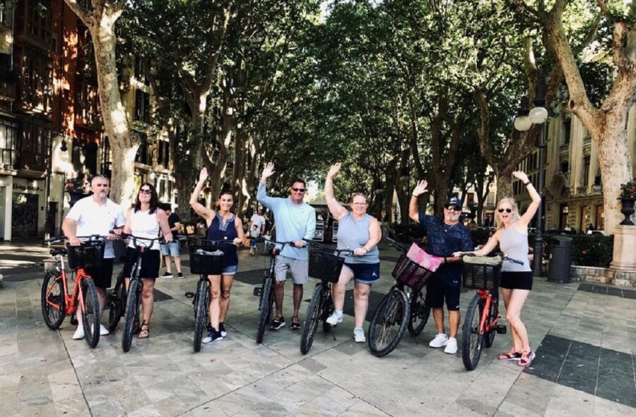 Palma de Mallorca: Guided Bicycle Tour with Tapas & a Drink - The convent, churches, and old-town squares