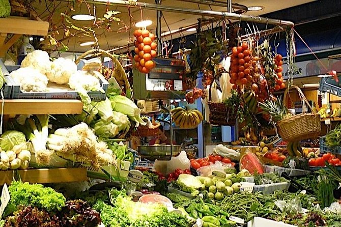 Palma de Mallorca Guided Tour with Hotel Pick up - Walking, buses, and the real pace