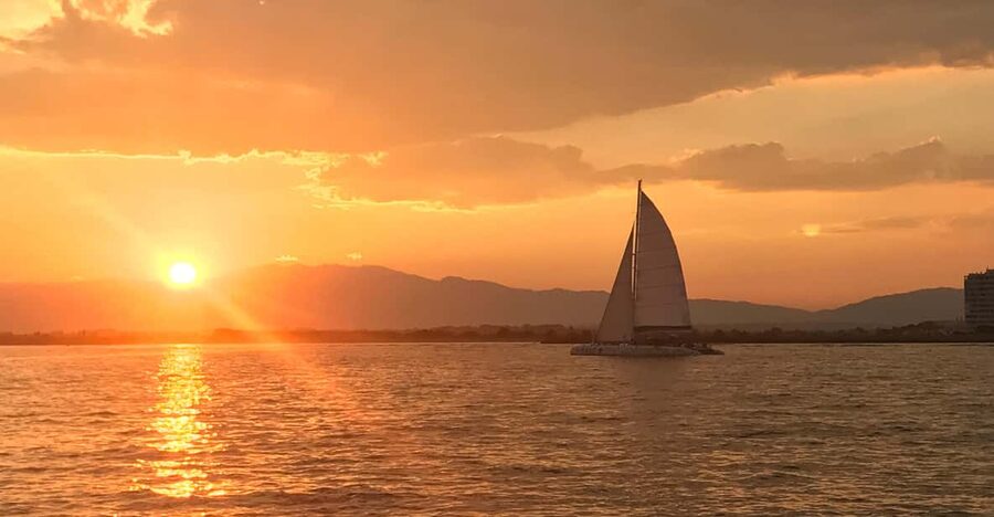 Palma de Mallorca: Sunset Sailing Catamaran Trip with Drink - Sailing out from the Port of Palma