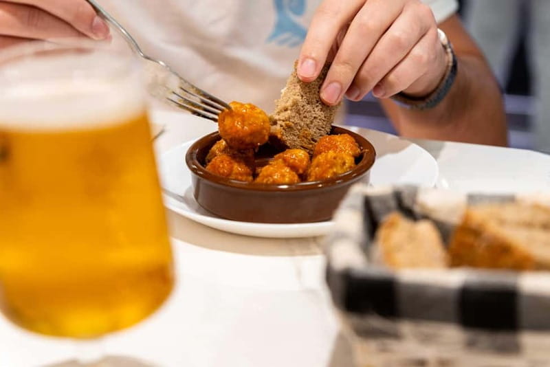 Palma de Mallorca: Traditional Mallorcan Food Tour - Starting with llonguet at Sa Caravana Cafe
