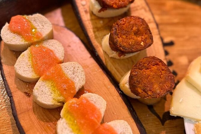 Palma Evening Tapas Walking Tour with Pinchos & Drinks - The quiet squares between food stops