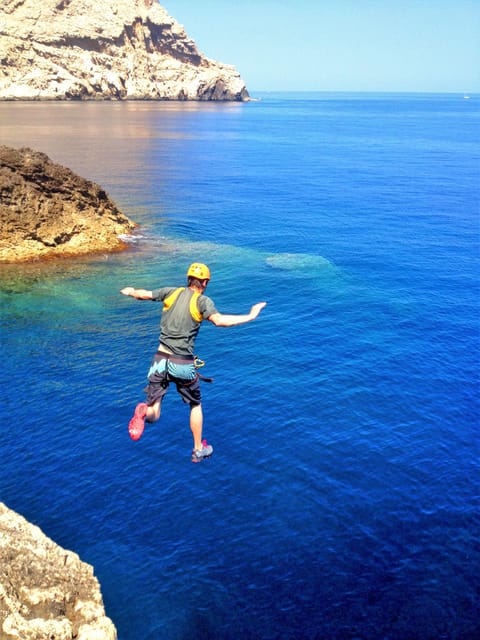 Pollença: Kayak and Coasteering Cliff Jumping - Starting at Cala Molins with a quick safety lesson