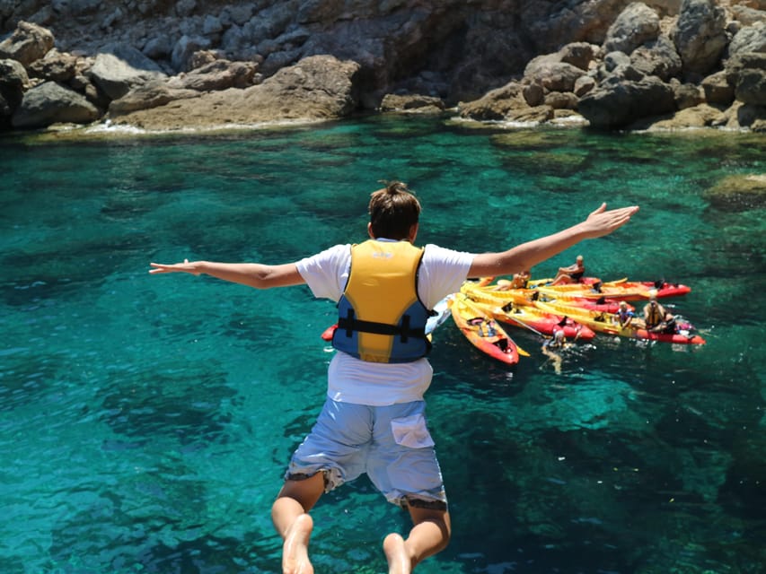 Pollença: Kayak and Coasteering Cliff Jumping - Reaching the adventure zone by sea