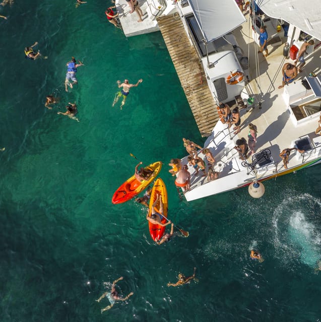 Port d'Alcudia: North Coast Catamaran Cruise with Meal - Kayaks, paddleboards, and snorkeling