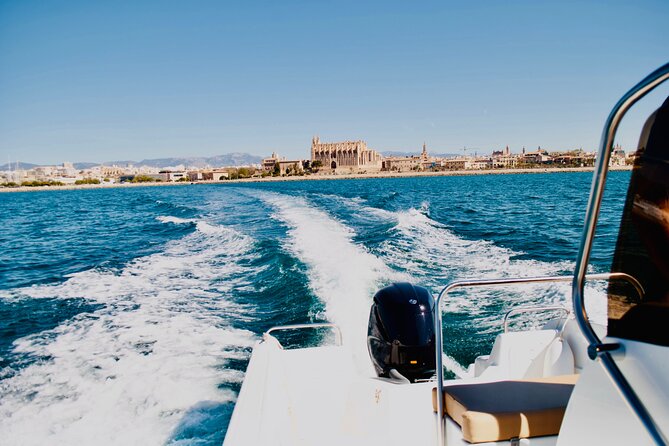 Private Boat Tour from Palma with Snorkeling and Paddle Surfing - Snorkeling in Clear Coves