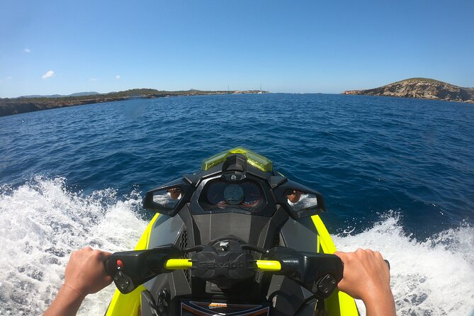 Private jet ski excursion Ibiza San Antonio Es Vedrà - Cala d’Hort frames the Es Vedrà views