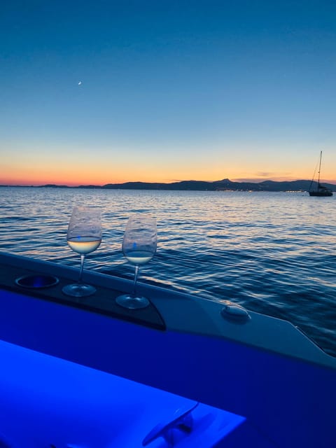Sunset Private Boat Trip to Marine Reserve Mallorca - Sunset Behind the Mountains and Palma