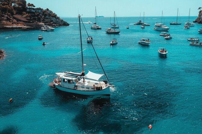 Traditional Mallorquin Llaut Cruise with Tapas and Drinks - Swimming, snorkeling, and the floating platform