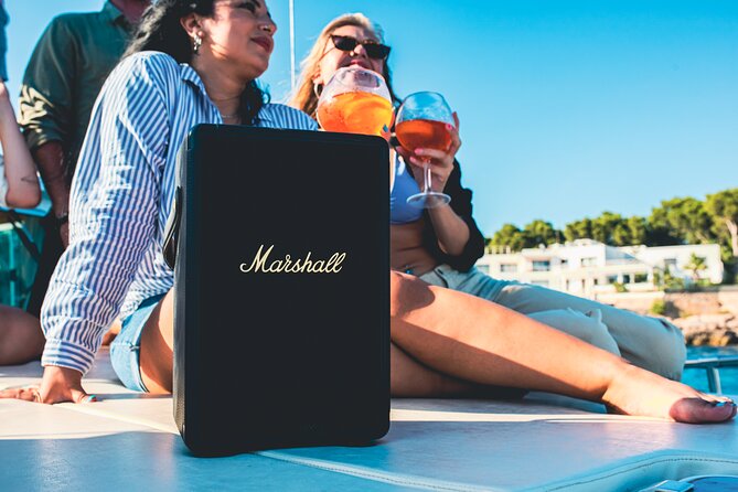 Traditional Mallorquin Llaut Cruise with Tapas and Drinks - Captain Joan and the feel on board