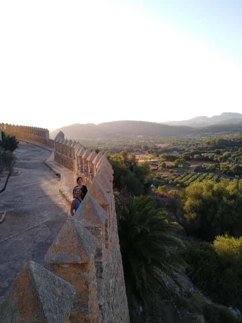 Travel and play tennis in Mallorca - Artà fortress and the town below it